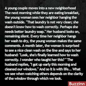 A Professor Peering Over His Glasses At His Students